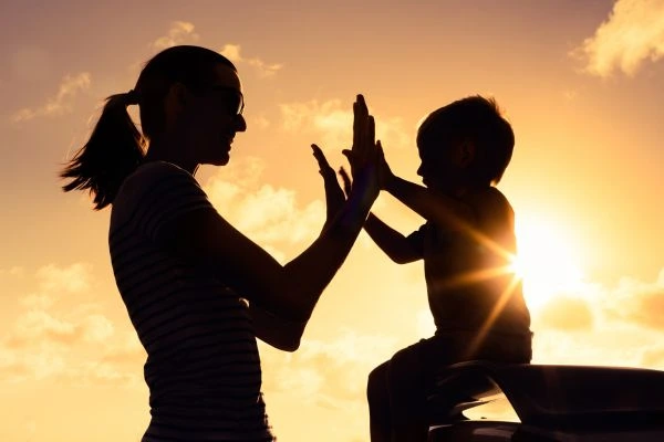 Image of happy mother and child after resolving child arrangements Caernarfon